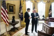  ?? ASSOCIATD PRESS ?? President Donald Trump speaks to White House Senior Adviser Jared Kushner, left, in the Oval Office in Washington.