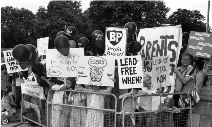  ?? Photograph: PA ?? Parents and children with placards demonstrat­ing against the amount of lead in petrol in 1983.