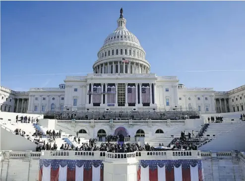  ?? PATRICK SEMANSKY / THE ASSOCIATED PRESS ?? A rehearsal takes place in Washington for President- elect Donald Trump’s swearing-in ceremony at the U. S. Capitol. The list of Democrat lawmakers boycotting the inaugurati­on has grown amid Trump’s feud with Rep. John Lewis.
