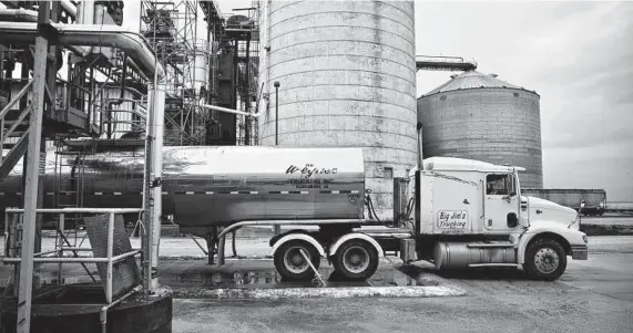  ?? Daniel Acker / Bloomberg ?? A tanker truck sits outside the POET ethanol biorefiner­y in Gowrie, Iowa. Oil lobbyists are eagerly waiting to see whether President Joe Biden will lower biofuel mandates. The issue pits corn farmers against Big Oil.