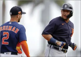  ?? JULIO CORTEZ - THE ASSOCIATED PRESS ?? Detroit Tigers designated hitter Miguel Cabrera, right, talks with Houston Astros third baseman Alex Bregman during the first inning of a spring training baseball game, Monday, March 9, 2020, in West Palm Beach, Fla.