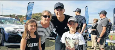  ??  ?? GRIPPING STUFF: Posing with Sasol BMW driver Gennaro Bonafede were Payton Gower, 7, Amanda Gower and Korben Gower, 11, at the Sasol GTC activation