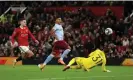  ?? Photograph: Lewis Storey/Getty Images ?? Ollie Watkins lifts the ball over Martin Dubravka to give Aston Villa the lead at Manchester United.