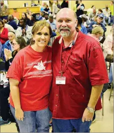  ?? FILE PHOTO ?? Traci and Rick Harvey of Bigelow are shown during one of the distributi­on days for Soul Food Mission Cafe in Conway, which they co-founded 16 years ago. The all-volunteer mission has been in various locations while it built a facility at 1717 S....