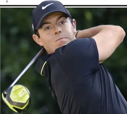  ?? AP ?? Eye on the ball: McIlroy is calm and precise as he cruises round in 69 shots with only one bogey