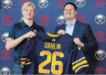  ?? JEFFREY T. BARNES THE ASSOCIATED PRESS ?? Rasmus Dahlin, left, will get plenty of opportunit­y to learn on the job, as the 18-year-old is expected to get plenty of ice time in Buffalo.