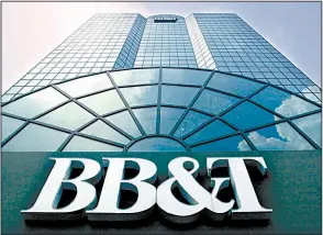 ?? AP ?? If plans by BB&amp;T bank, headquarte­red in Winston-Salem, N.C., to buy SunTrust Banks are approved, the newly merged bank would serve more than 10 million households.
