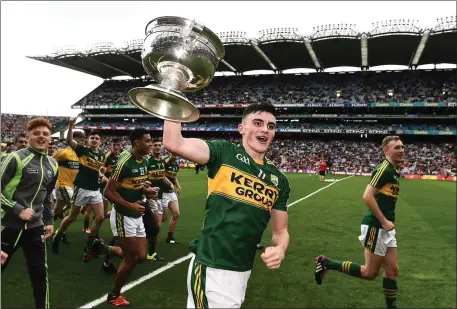  ??  ?? Kerry captain Sean O’Shea celebrates with the cup after the Electric Ireland GAA Football All-Ireland Minor Championsh­ip Final match between Kerry and Galway at Croke Park in Dublin Photo by David Maher / Sportsfile