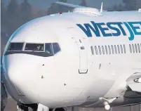  ?? DARRYL DYCK THE CANADIAN PRESS FILE PHOTO ?? In recent years, WestJet has been made over into an impersonal, multi-functional airline, David Olive writes.