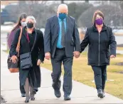  ?? KYLE TELECHAN/POST-TRIBUNE ?? Ex-Whiting Mayor Joseph Stahura arrives for sentencing Wednesday with wife, Diane, and attorney Kerry Connor.