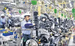  ?? REUTERS ?? Indian manufactur­ers signalled another monthly rise in cost burdens, thereby taking the current stretch of inflation to 13 months.