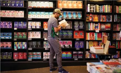  ??  ?? ‘Authors, bricks-and-mortar bookshops and publishers alike fear that the industry faces a powerful new threat.’ Photograph: Christophe­r Thomond/The Guardian