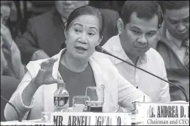  ??  ?? GEREMY PINTOLO Pagcor chief Andrea Domingo testifies at the Senate hearing on the BI bribery scandal yesterday.