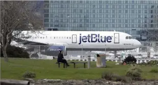  ?? Justin Sullivan/getty Images ?? Jetblue Airways CEO Robin Hayes said a proposed merger with Spirit Airlines would boost competitio­n by making his New York-based airline bigger and better able to go up against the other major carriers.