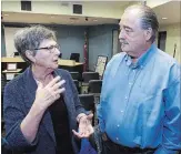  ?? CLIFFORD SKARSTEDT/EXAMINER ?? Outgoing Selwyn Mayor Mary Smith chats with mayoral candidate Ron Black as they wait for municipal election results at Selwyn’s town office Monday. Andy Mitchell won the mayor’s seat.