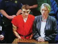  ?? AP/South Florida Sun-Sentinel/SUSAN STOCKER ?? Nikolas Cruz appears by video before Judge Kim Theresa Mollica in Broward County Court on Thursday, where he was arraigned on 17 counts of premeditat­ed murder and ordered held without bail.