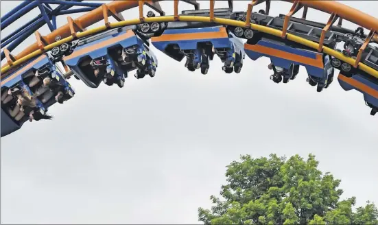  ?? Photos by Skip Dickstein / Times Union ?? Six Flags Great Escape theme park in Lake George, which filled 1,500 jobs, employs college students from 12 countries. Capital Region hotels, restaurant­s and other tourist attraction­s also hire internatio­nal employees.