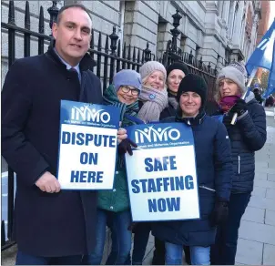  ??  ?? Deputy Marc MacSharry on the picket line outside Holles Street Hospital in Dublin where amongst the nurses were Eleanor Durkin originally from Castleconn­or and Partria O’Connell originally from Rosses Point.