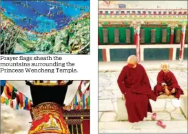  ??  ?? Prayer flags sheath the mountains surroundin­g the Princess Wencheng Temple. Monks rest in front of prayer wheels at the world’s largest prayer-stone wall.