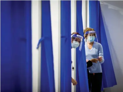  ??  ?? The Royal Exhibition Building COVID-19 vaccinatio­n centre. © Darrian Traynor / Getty Images