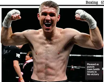  ?? ?? Pleased as punch: Liam Smith revels in his victory