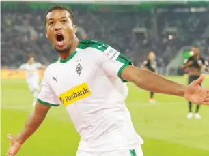  ??  ?? Borussia Monchengla­dbach striker, Alassane Plea celebrates after scoring a goal