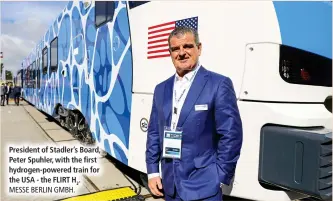  ?? ?? President of Stadler’s Board, Peter Spuhler, with the first hydrogen-powered train for the USA - the FLIRT H .