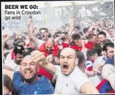  ??  ?? BEER WE GO: Fans in Croydon go wild