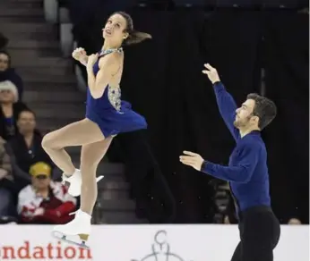  ?? DARREN CALABRESE/THE CANADIAN PRESS FILE PHOTO ?? With a nudge from social media, Meagan Duhamel and Eric Radford ditched the risky triple Axel throw.