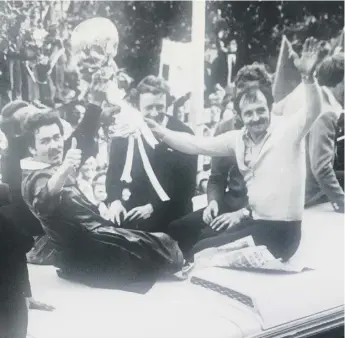  ??  ?? HOMECOMING HERO: Jeff Barmby, right, celebrates during Boro’s 1977 FA Trophy final victory parade