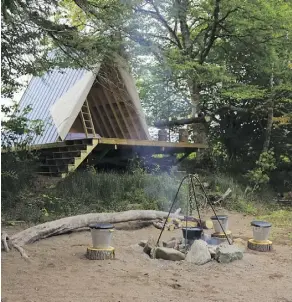  ??  ?? A rustic riverside A-frame cabin was one of the Buckles brothers’ projects.