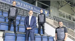  ??  ?? Top team Chairman Steve Brown with manager Callum Davidson and first team coaches Alec Cleland and Steven MacLean. Photos: PPA