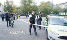  ?? — AFP ?? Police officers man a cordon close to the scene following an incident in the South Kensington district of London on Saturday.