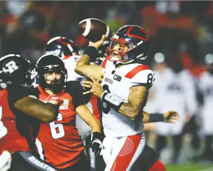  ?? THE CANADIAN PRESS ?? Alouettes quarterbac­k Vernon Adams Jr. steps into a pass against the Redblacks during the first half of Montreal's 51-29 victory at Ottawa's TD Place on Friday night. Adams threw for four touchdowns in the lopsided win. The Als are now 2-2 on the season.