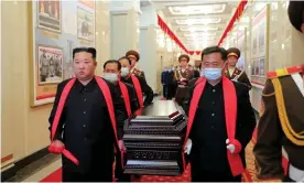  ?? Photograph: AFP/Getty Images ?? North Korean leader Kim Jong-un (left) carries Hyon Chol-hae’s casket during his funeral service in Pyongyang.