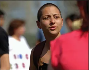  ?? John McCall/South Florida Sun-Sentinel via AP ?? Protest: Emma Gonzalez, a senior who survived Wednesday's shooting at Marjory Stoneman Douglas High School, talks with people at North Community Park in Parkland, Fla., Sunday, Feb. 18, 2018. Gonzalez is one of the students who escaped the deadly...