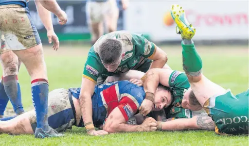  ?? Jackie Meredith ?? Hornets Sam Hopkins scores a try during Sunday’s clash at the Crown Oil Arena