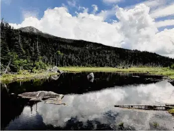  ?? Brendon Loomis/adirondack Explorer ?? Lake Tear of the Clouds, above, is a source of the Hudson River. A Cornell University study found that only 5 percent of Adirondack lakes may sustain enough cold, oxygenated water for cold-water species if trends continue.