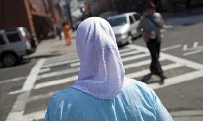  ?? Photograph: Robert Nickelsber­g/Getty Images ?? The settlement resolves a lawsuit filed in 2018 by Jamilla Clark and Arwa Aziz, who said they felt shame and trauma when police forced them to remove their hijabs for their mugshots.