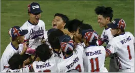  ?? TERRY PIERSON — STAFF PHOTOGRAPH­ER ?? Hawaii celebrates after defeating Arizona 9-2to win the Little League West Regional championsh­ip game at Al Houghton Stadium in San Bernardino on Friday.