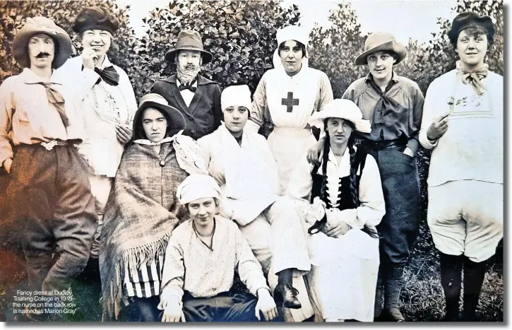  ?? ?? Fancy dress at Dudley Training College in 1919 the nurse on the back row is named as Marion Gray