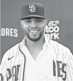  ?? DENIS POROY/ AP ?? Xander Bogaerts is introduced after signing am 11- year, $ 280 million deal with the Padres.
