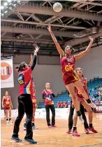  ??  ?? Action from the match between Sri Lanka and Malaysia Pic courtesy Netball Singapore