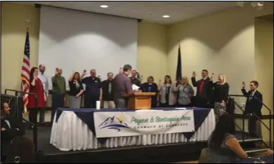  ??  ?? Board members and executive officers of the Payson & Santaquin Area Chamber of Commerce were sworn into office during the chamber’s 2017 Installati­on & Community Awards Banquet.