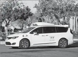  ?? KRIS TRIPPLAAR/SIPA USA 2018 ?? For the next few weeks, Waymo rides in the Phoenix area won’t have backup drivers.