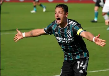  ?? AP Photo/Lynne Sladky ?? LA Galaxy forward Javier Hernandez (14) reacts after scoring a goal during the second half of an MLS soccer match against Inter Miami, on April 18 in Fort Lauderdale, Fla.