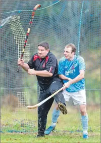  ?? Photograph: Neil Paterson. ?? Glenurquha­rt club president Gary Mackintosh had a tough day stepping in as goalkeeper for the game against Caberfeidh, with Kevin Bartlett making a four- goal return for Cabers in a 6-2 win at Castle Leod.