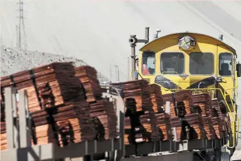  ?? ?? Outputdown: A train loaded with copper cathodes travels inside the Chuquicama­ta copper mine in Chile. The production of the world’s largest copper producer fell by 1.5% over
the first half of 2022. — Reuters