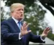  ?? MANUEL BALCE CENETA - THE ASSOCIATED PRESS ?? President Donald Trump speaks to reporters on the South Lawn of the White House in Washington, Friday.