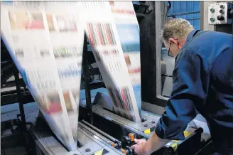  ?? ADRIEN VECZAN/THE CHRONICLE HERALD ?? A test run of The Chronicle Herald’s re-design is printed at the Bluewater printing press, in Halifax, March 4, 2013.